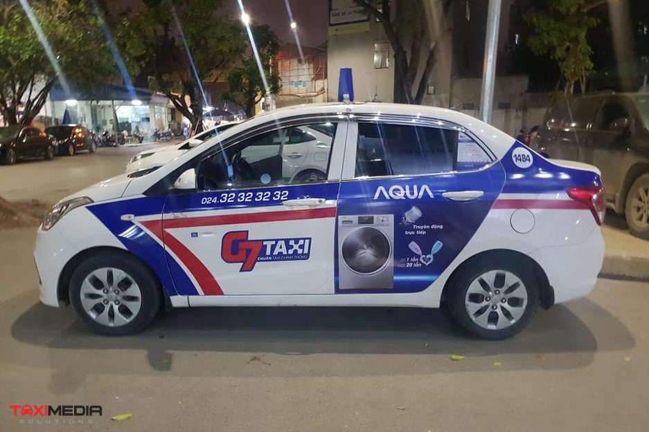 quảng cáo trên xe taxi g7