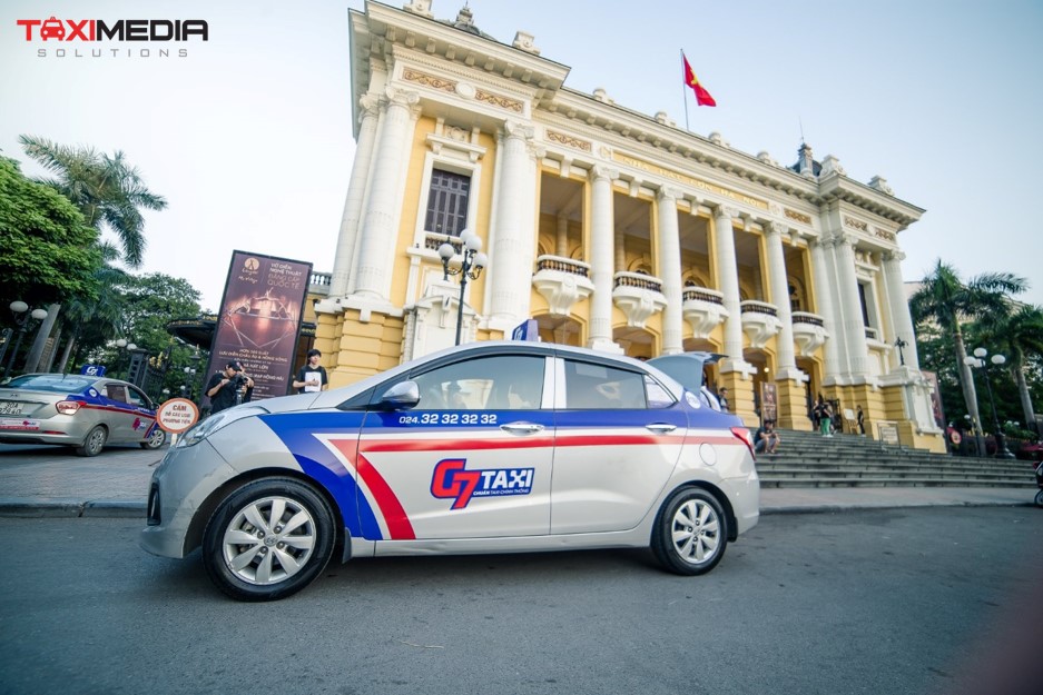 quảng cáo trên xe taxi g7