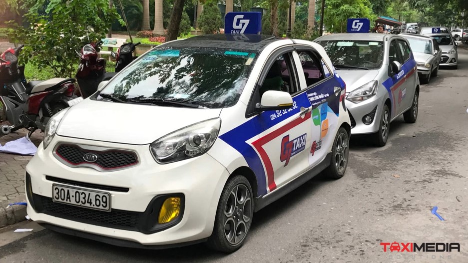 quảng cáo trên xe taxi g7