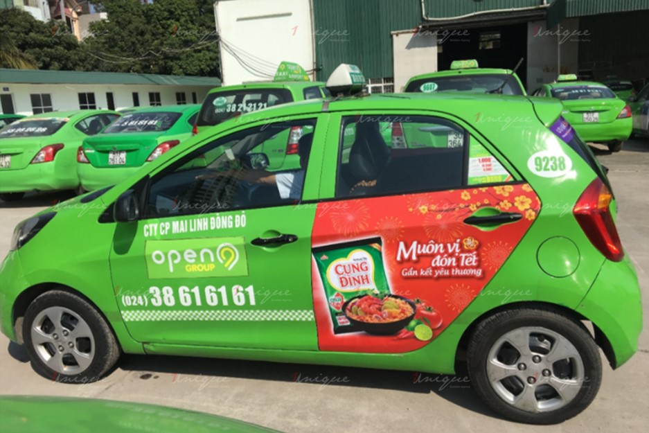 quảng cáo trên xe taxi